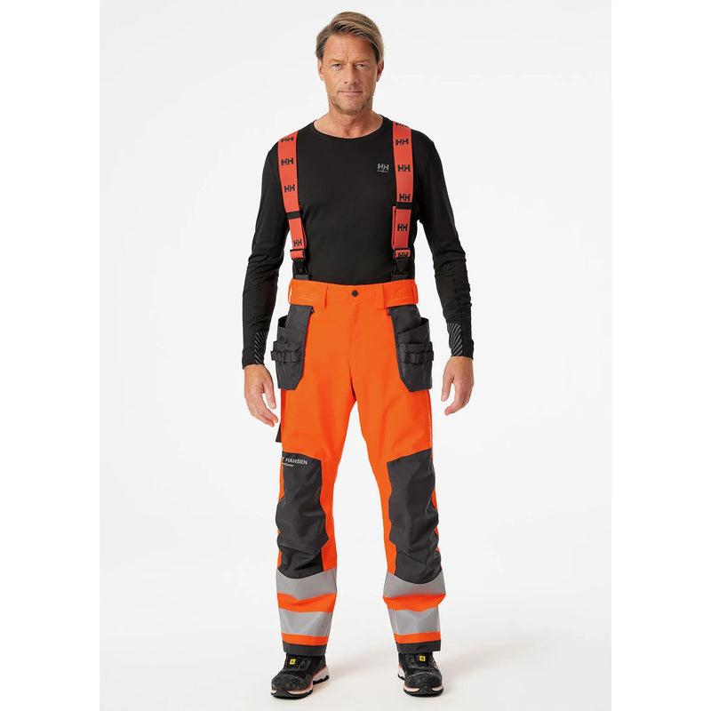 Ielādējiet attēlu galerijas skatītājā, Puskombinezons HELLY HANSEN ALNA 2.0 Hi Vis Waterproof Shell Construction Class 2 71493
