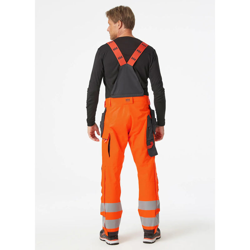 Ielādējiet attēlu galerijas skatītājā, Puskombinezons HELLY HANSEN ALNA 2.0 Hi Vis Waterproof Shell Construction Class 2 71493
