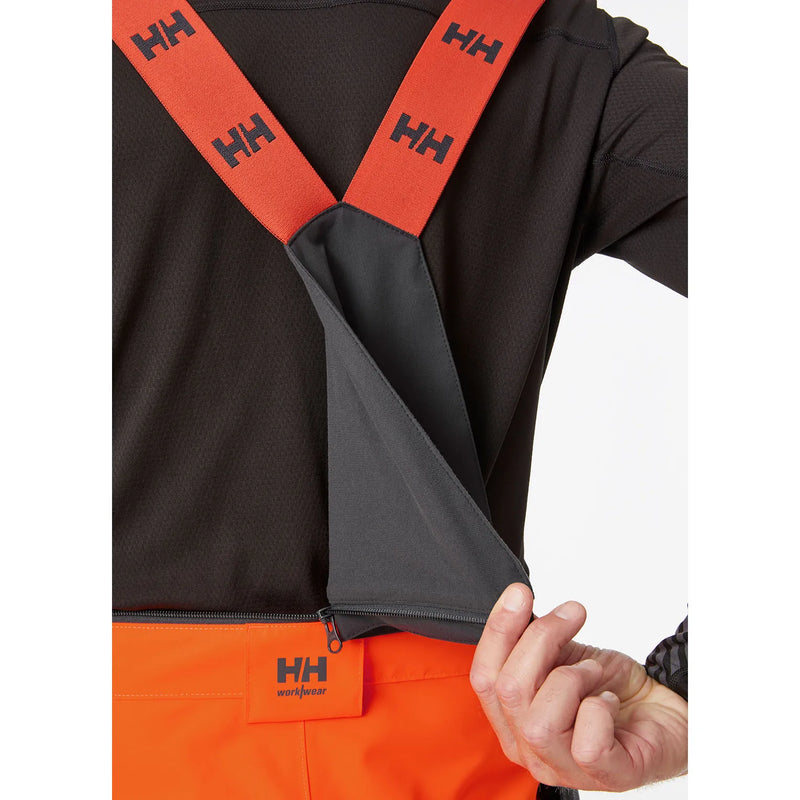 Ielādējiet attēlu galerijas skatītājā, Puskombinezons HELLY HANSEN ALNA 2.0 Hi Vis Waterproof Shell Construction Class 2 71493
