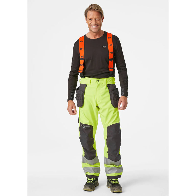 Ielādējiet attēlu galerijas skatītājā, Puskombinezons HELLY HANSEN ALNA 2.0 Hi Vis Waterproof Shell Construction Class 2 71493
