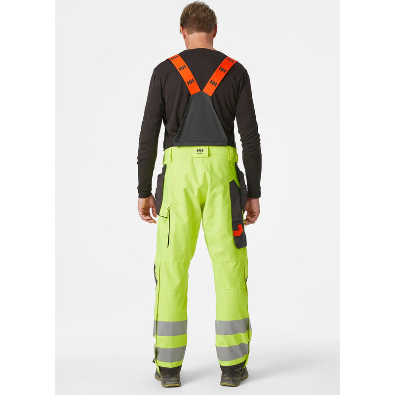 Ielādējiet attēlu galerijas skatītājā, Puskombinezons HELLY HANSEN ALNA 2.0 Hi Vis Waterproof Shell Construction Class 2 71493
