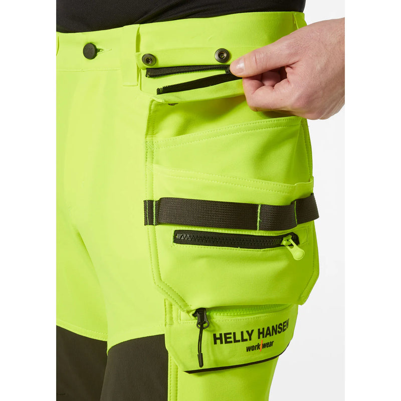 Ielādējiet attēlu galerijas skatītājā, Bikses HELLY HANSEN ICU BRZ Hi Vis Construction Class 2 77499
