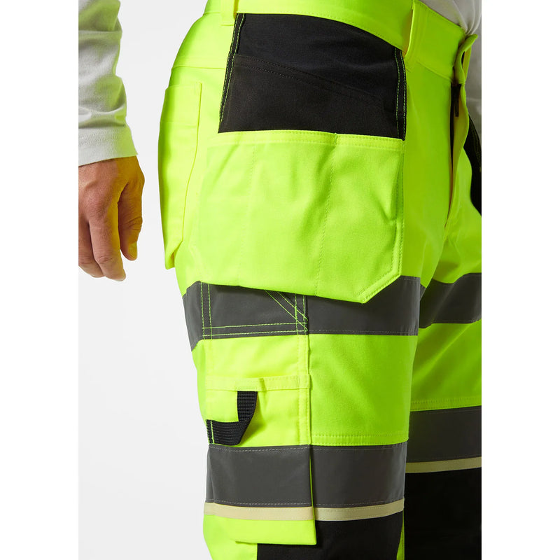 Ielādējiet attēlu galerijas skatītājā, Bikses HELLY HANSEN UC-ME Hi Vis Construction Pirate 77518
